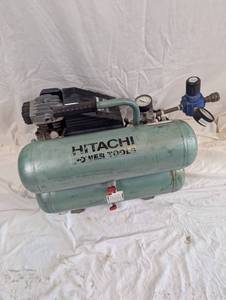 lot 31 image: Hitachi Koki Air Compressor (PartsRepair)