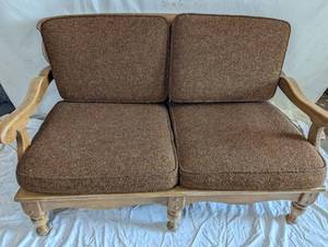 lot 57 image: Wooden Frame Loveseat with Cushions