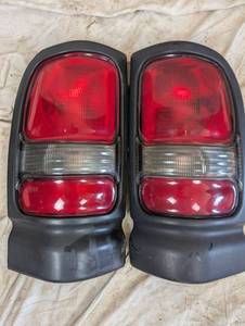 lot 64 image: Pair of Chrysler Tail Light Assemblies