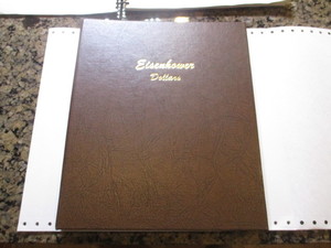 Completed Set of mint state Eisenhower Silver Dollars with all Silver Ike's included in Dansco Album