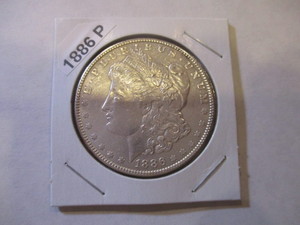 lot 8 image: 1886-P Morgan Silver Dollar