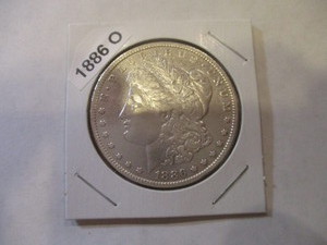 lot 9 image: 1886-O Morgan Silver Dollar