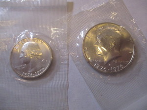 lot 78 image: 1976-S Kennedy Silver Half  Dollar & Washington Silver Quarter in original government film from mint set