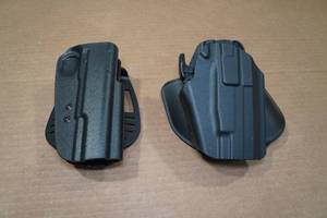 lot 108 image: 2 Formed Plastic Paddle Holsters