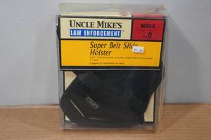 lot 195 image: Uncle Mikes Law Enforcement Super Belt Slide Holster
