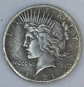 lot 37 image: Poormans Coin Look alike 1921 Peace Dollar