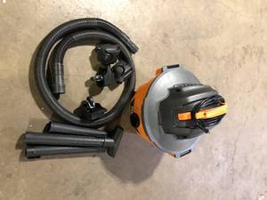 lot 34 image: RIDGID 6 Gallon 3.5 Peak HP NXT Shop Vacuum Wet Dry Vac with General Debris Filter, Locking Hose and Accessory Attachments Used Good   Customer Returns See Pictures