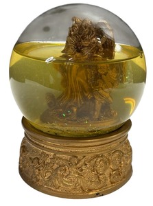 lot 048 image: Angel Playing Harmonica with Child Gold Glitter Snow Globe Home Decor