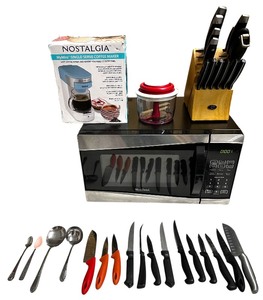 lot 074 image: Kitchen Bundle  Microwave  Nostalgia Single Serve Coffee Maker  Knife Block  Mixed Knife and Spoons  Chefn VeggiChop Hand-Powered Food Chopper