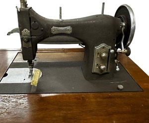 lot 002 image: Domestic Rotary Electric Sewing Machine, from the 1940s