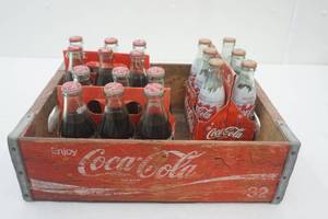 lot 9 image: VintageAntique Coca-Cola Crate with 3 full six pack bottles