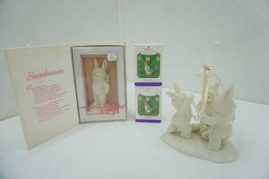 lot 32 image: Springtime Stories of the Snow bunnies Figurines & 2ct Hallmark Keepsake Ornaments Peter Rabbit