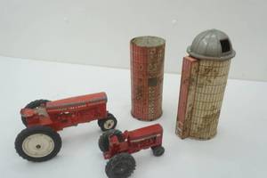 lot 85 image: Vintage Toy Tractors & Tin Silos