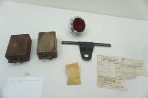 lot 116 image: Ford Model A Ignition Coils & 1930 Model A Coup Light