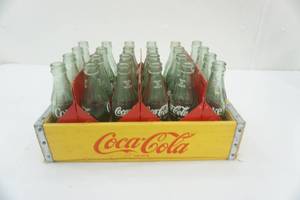 lot 138 image: Vintage Coca-Cola Crate w24 glass coke bottles