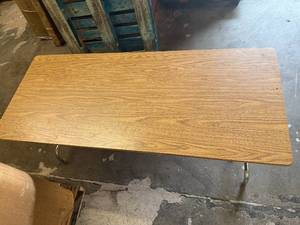 lot 07 image: Table with Surge Protector