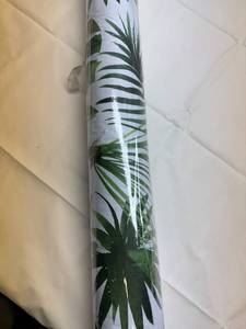 lot 4 image: MM. Flannel Backed Vinyl-54 Wide 15yds-Damaged on First few MM. Layers of Roll-See Photos