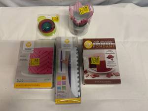 lot 40 image: Fondant, Shaped CuttersBaking cups,  & Icing Comb