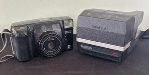 lot 211 image: Vintage Minolta Freedom Zoom 90 and Polaroid Sun 600 Cameras