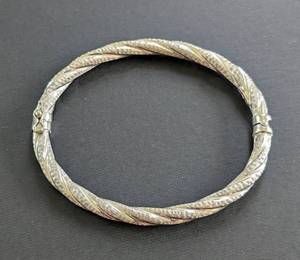 lot 38A image: 14k White Gold Twisted Bangle Bracelet