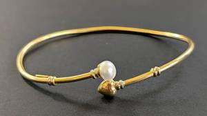 lot 216B image: 18k Yellow Gold and Pearl Bangle Bracelet