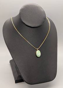 lot 344 image: 14k Yellow Gold Necklace and Carved Jadeite Pendant