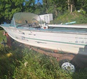 1963 VINTAGE 16'  BOAT, MOTOR, AND TRAILER.