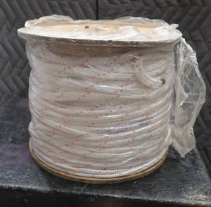 lot 106 image: LARGE SPOOL OF NEW ROPE.