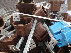 lot 118 image: LG BOX OF FIXTURE BOXES W BAR HANGERS