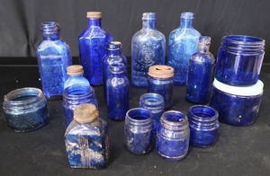 lot 123 image: 18 COBALT BLUE GLASS BOTTLES
