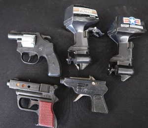 lot 129 image: CAP GUNS AND MOTORS