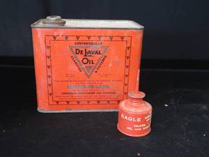 lot 135 image: RARE VINTAGE OIL CANS