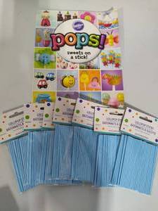 lot 41 image: Cake Pop Recipe Book and Sticks