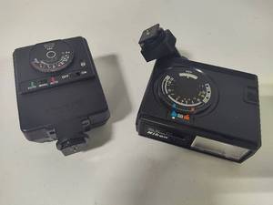 lot 157 image: Nikon SB-10 & Canon Speedlite 155A Flashes