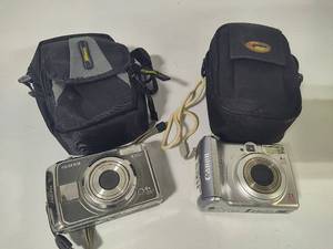 lot 158 image: Fuji Fine Pix A825 & Canon Power Shot A550 Cameras