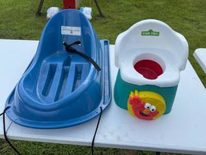 lot 10 image: SNOW SLED AND SESAME STREET POTTY