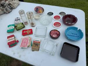 lot 105 image: ASH TRAYS AND PLAYING CARDS