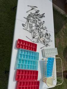 lot 124 image: ICE CUBE TRAYS AND SILVERWARE
