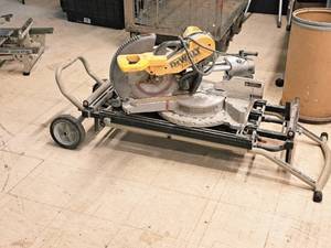 lot 3 image: DeWalt 12 Double Bevel Sliding Compound Miter Saw DW718 with Delta Universal Miter Saw Utility Vehicle  Stand