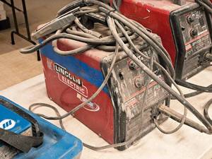 lot 11 image: Lincoln Electric SP-135 Plus Single-Phase 28V Arc Welder with Welding Cables