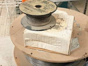 lot 21 image: Lot of (1 Full Spool  1 Partial Spool) Corex Self-Shield 11GS .035 Welding Wire