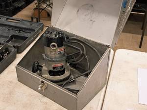 lot 62 image: Porter-Cable Router with Metal Case