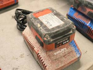 lot 129 image: Hilti B22 4.0 21.6V 85.54Wh Li-ion Battery Pack and Hilti C 436-90 Battery Charger