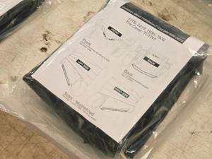 lot 163 image: UNV19 TC12x5 Tire Cover (in original packaging)