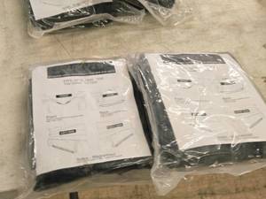 lot 165 image: Lot of (2) UNV19 TC12x5 Tire Cover (in original packaging)