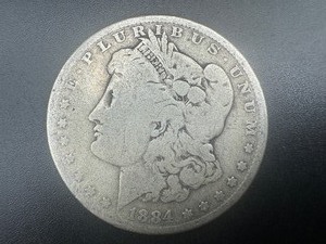 lot 12 image: 1884 Morgan Silver Dollar