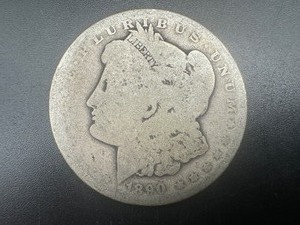 lot 13 image: 1890-O Morgan Silver Dollar