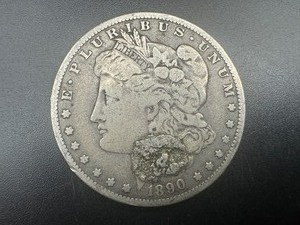 lot 20 image: 1890-O Morgan Silver Dollar