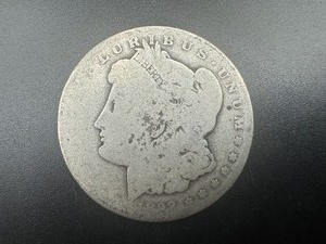 lot 22 image: Better Date 1892 Morgan Silver Dollar