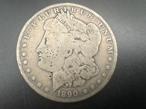 lot 32 image: 1890-O Morgan Silver Dollar